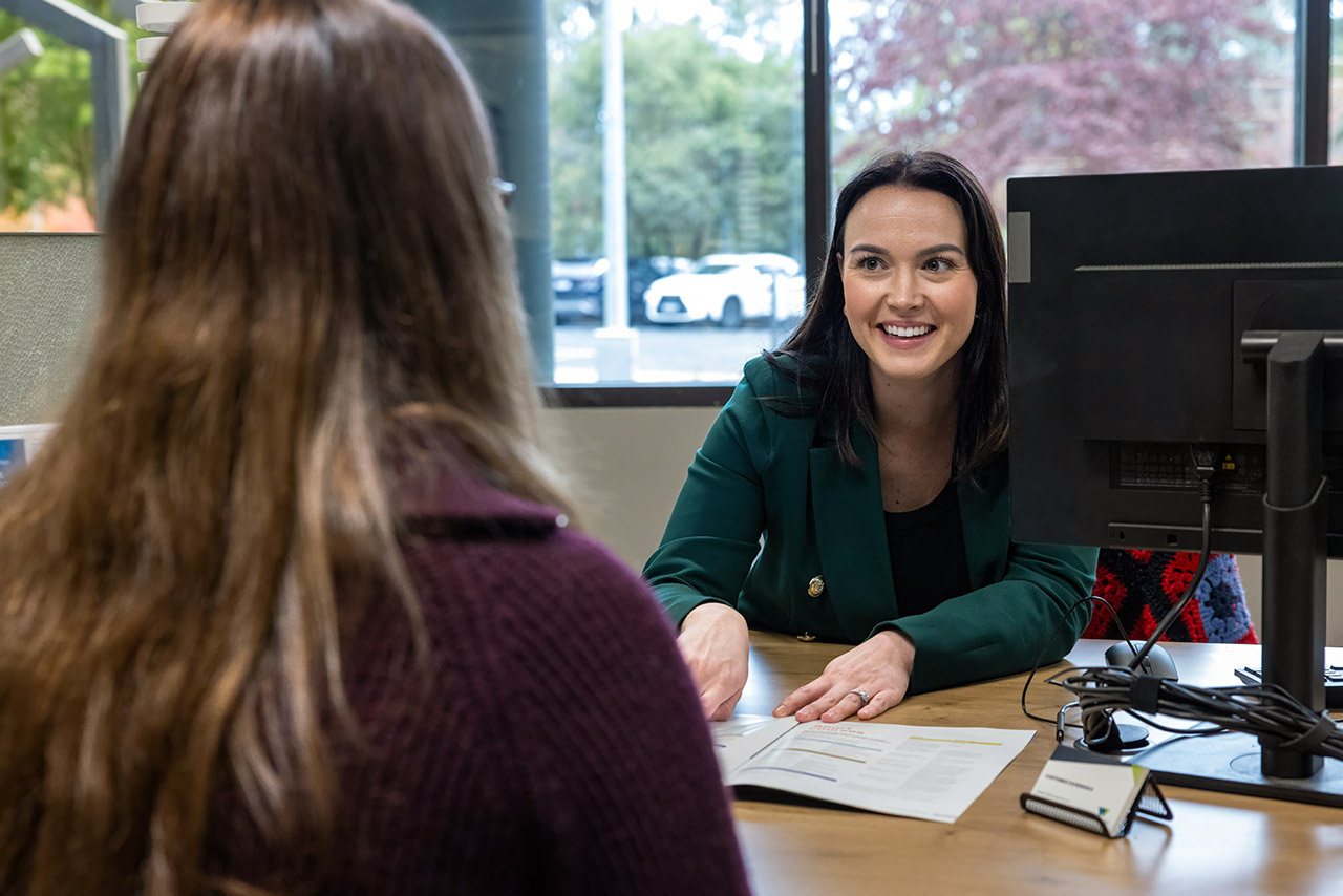 Customer Service assisting a student